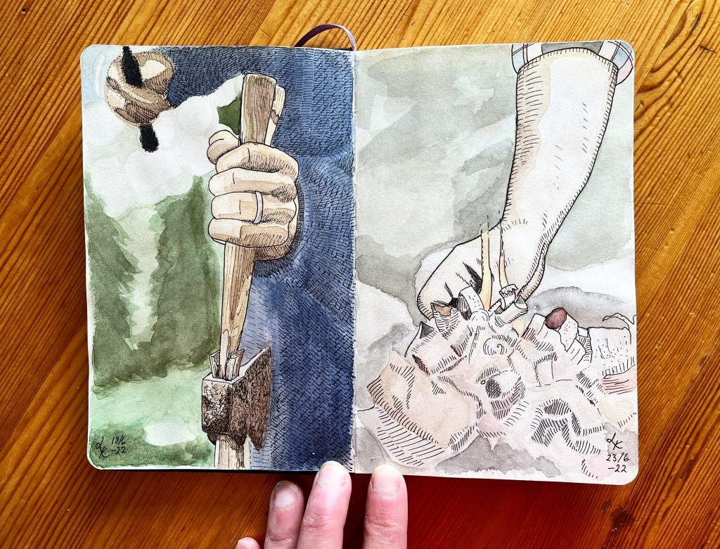 Uppslag i Lisa Krigas skissbok: händer som hugger ved och tänder eld
